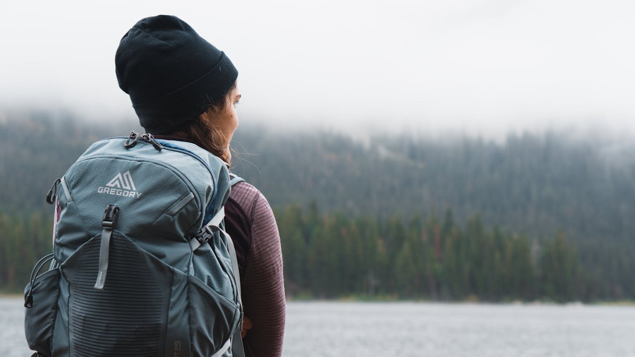 Close-up Photography of Woman Carrying Gray Backpack